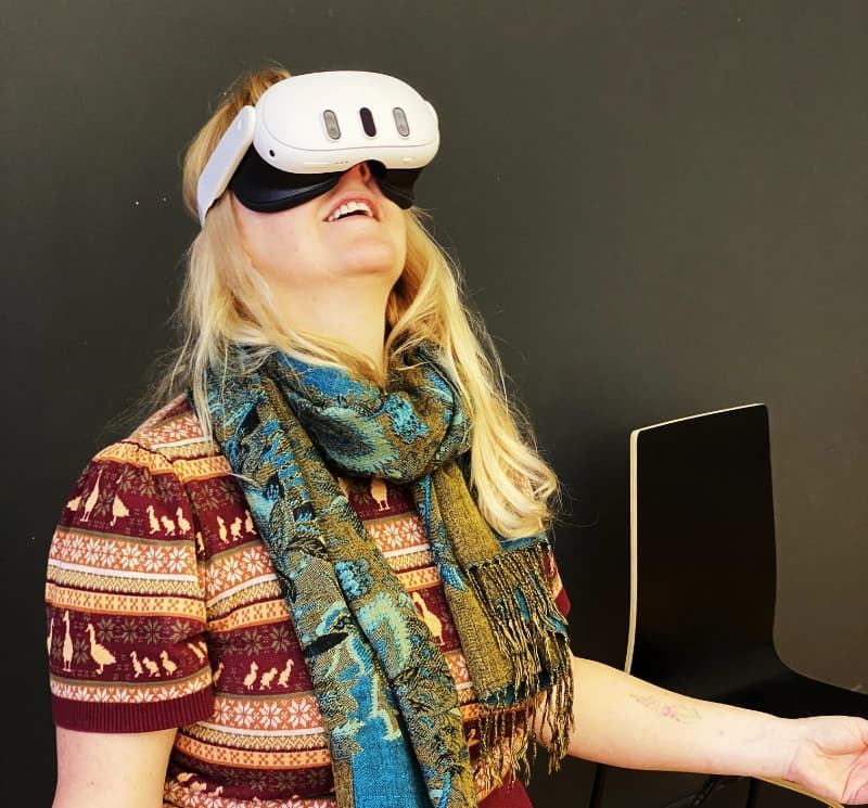 Person wearing VR headset experiencing immersive technology